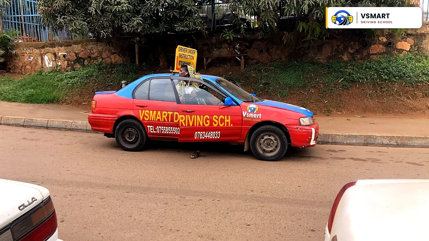 VSMART branded training car on a Kampala road